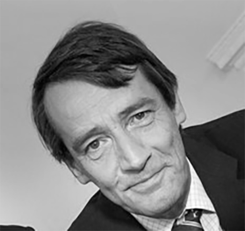 A black and white photographic headshot of Robert Kirk